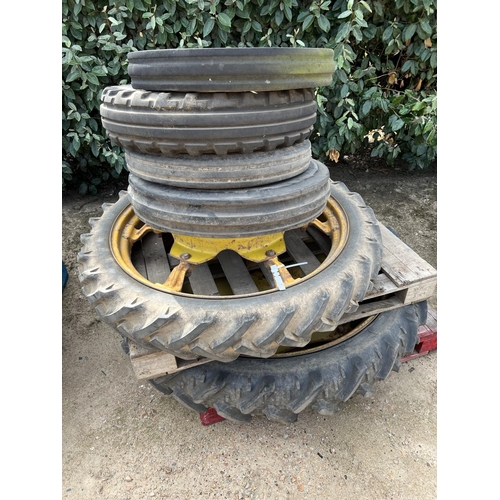 35 - A 8.3-44 rowcrop wheel, tyre and centre, a 7.2/7-36 rowcrop wheel, tyre and centre together with fou... 