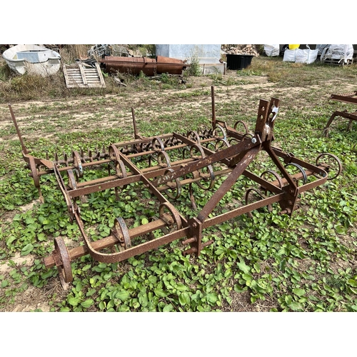 44 - A spring tine scarifier fitted a star roller (7' working width - 21 tines)