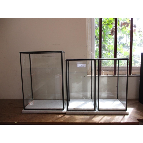 105 - Three table top display cases