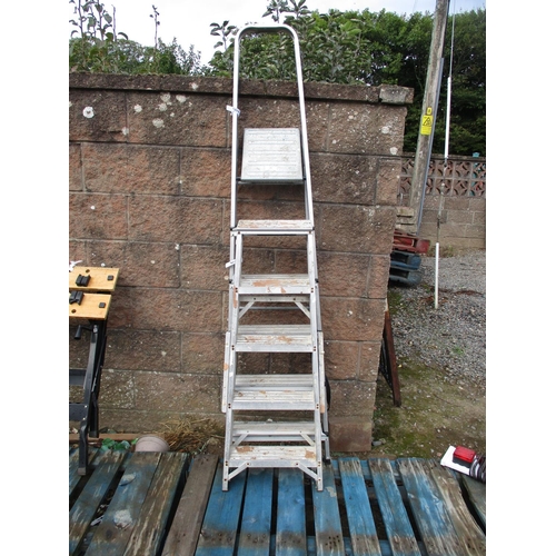 29 - A six tread step ladder together with a five tread step ladder