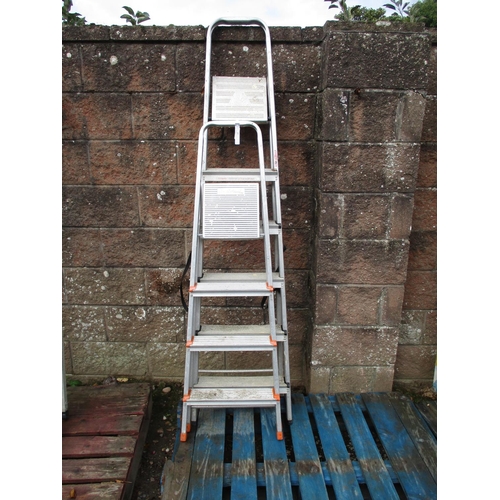 37 - A six tread step ladder together with a four tread step ladder