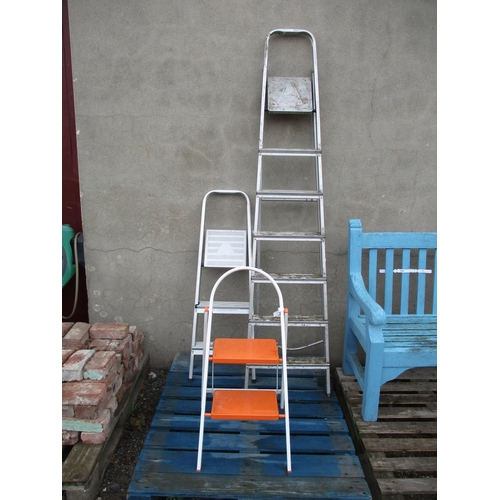 52 - A seven tread step ladder, a three tread step ladder and a two tread step ladder