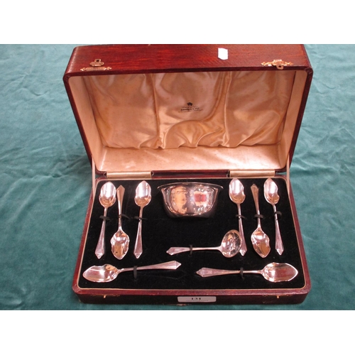 131 - A cased set of six sterling silver teaspoons together with a sugar bowl and sugar spoon