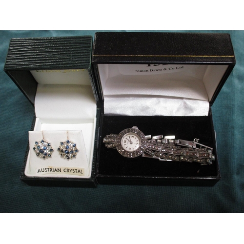 132 - A Titus Swiss silver and marcasite cocktail watch together with a pair of silver and Austrian crysta... 