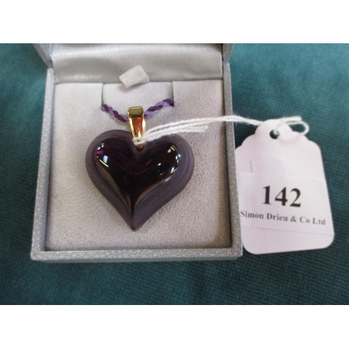 142 - A Lalique heart pendant