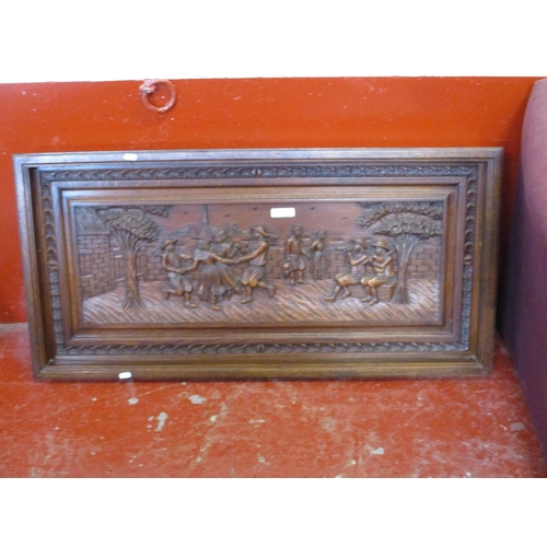 185 - A Breton carved oak panel