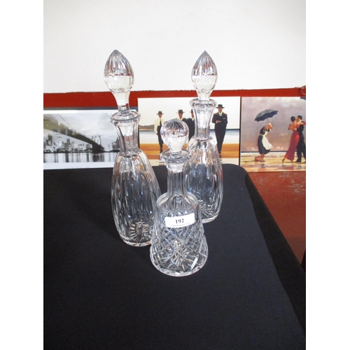 192 - Three crystal decanters