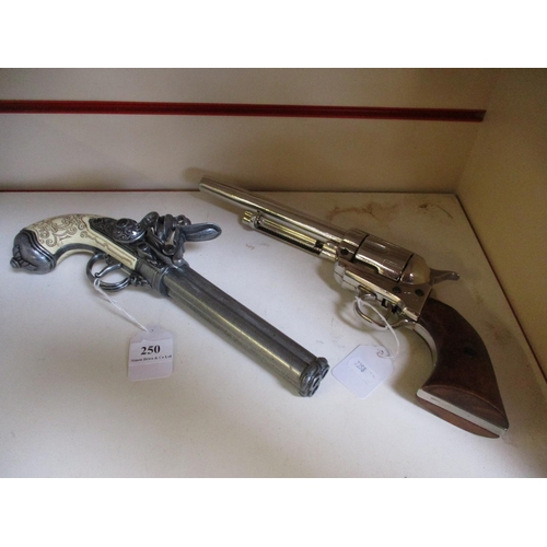 250 - A replica flintlock pistol together with a replica revolver