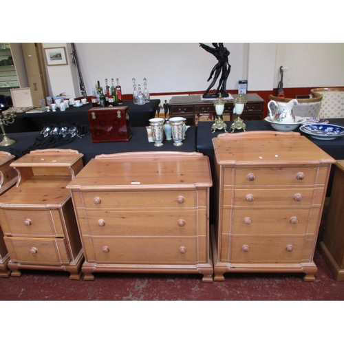 256 - A satinwood bedroom suite consisting of a four drawer chest, a three drawer chest, two bedside cabin... 