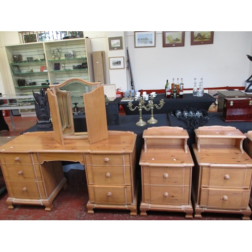 256 - A satinwood bedroom suite consisting of a four drawer chest, a three drawer chest, two bedside cabin... 