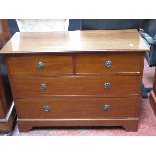 261 - A chest of two short over two long drawers