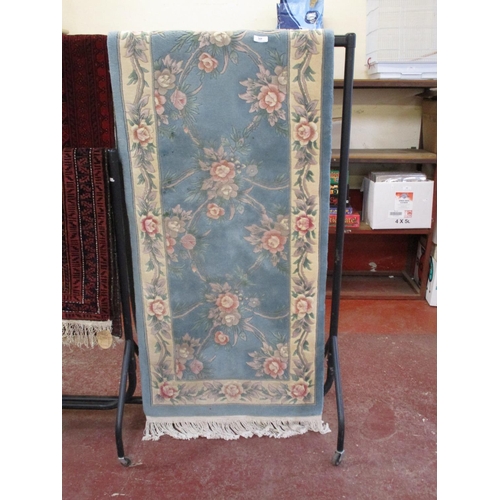 269 - A hand made Chinese 100% wool floor runner