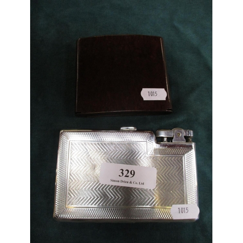 329 - Two vintage cigarette cases one with built in lighter