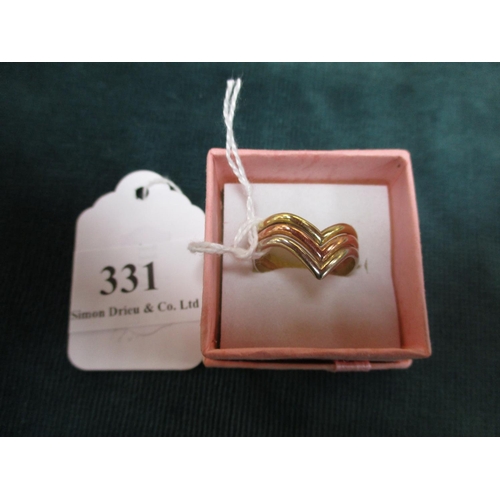 331 - A 9 carat rose, yellow and white gold wishbone ring