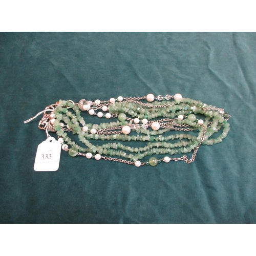 333 - A jade glass and pearl multi strand necklace