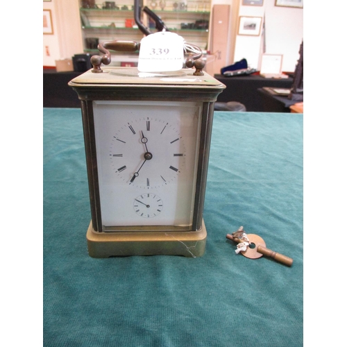 339 - A brass cased carriage clock