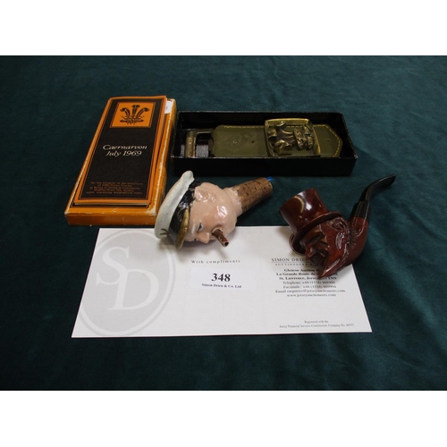 348 - A Prince of Wales bottle opener, a Winston Churchill bottle pourer and a carved wooden smoking pipe