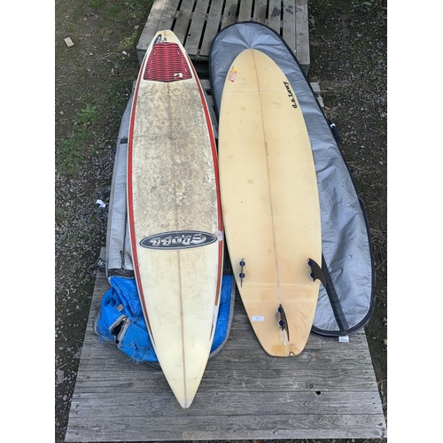 17 - A Grubb surfboard together with a D.A. Lewy surfboard