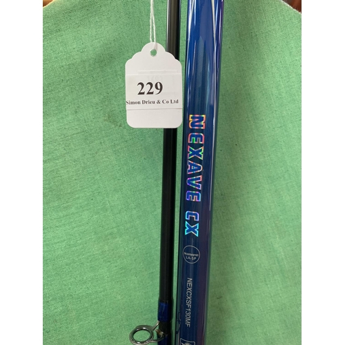 229 - A Shimano Nexave 13' beachcaster fishing rod