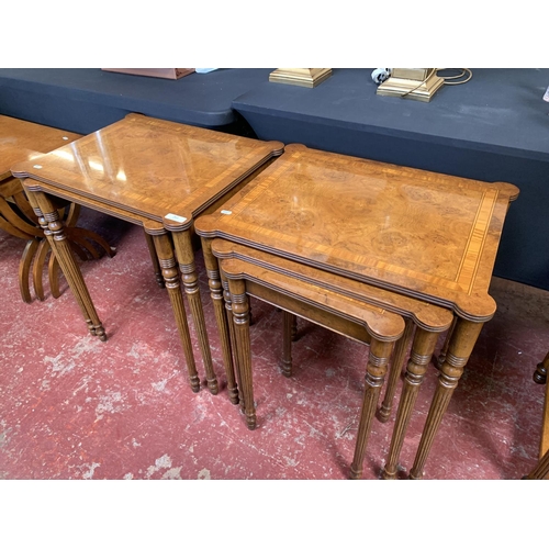 261 - A burr walnut graduated nest of three occasional tables together with two others