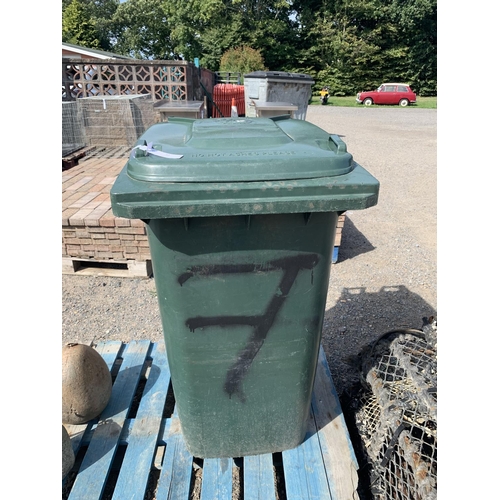 32 - A green PVC wheelie bin