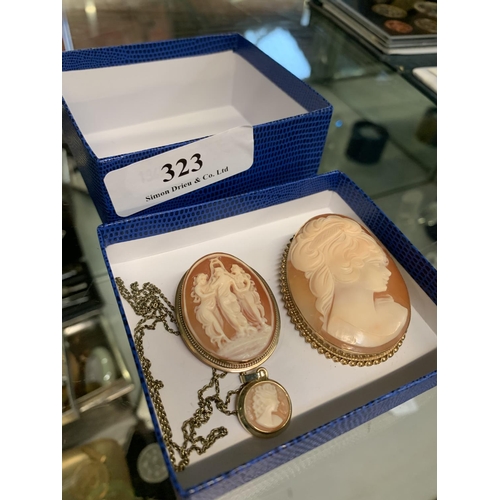 323 - Two 9 carat gold cameo brooches together with a cameo pendant