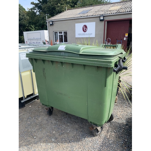 94 - A green PVC commerical wheelie bin