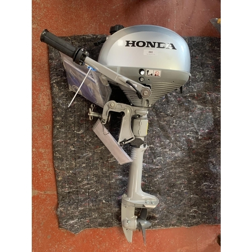 101 - A 2021 Honda 2.3hp four stroke outboard engine (as new approximately 1 hour running time)