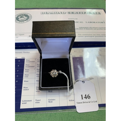 146 - An 18 carat white gold solitaire diamond ring 3.11 carat complete with certification size N