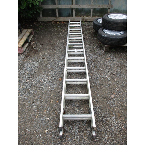 63 - An aluminium twelve tread double extension ladder