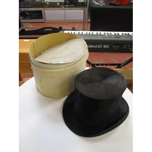 288 - A gentleman's vintage top hat retailed by A. De Gruchy & Co. of St. Helier, Jersey, the interior ins... 