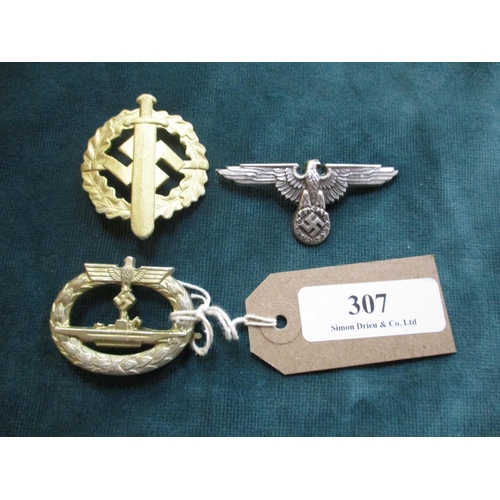 307 - A German World War II Submarine badge, sports badge and Eagle