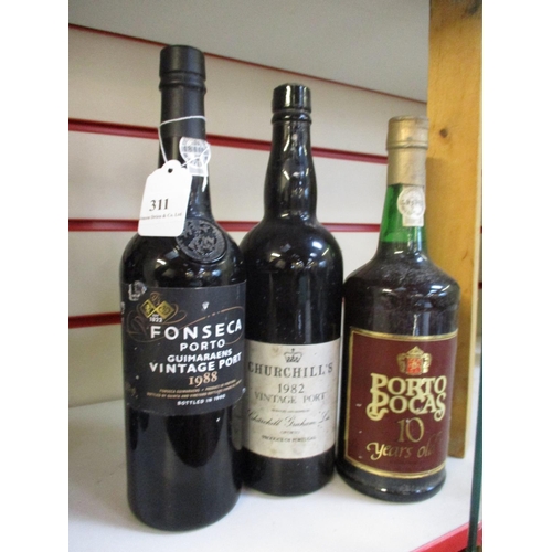 311 - A bottle of Churchills 1982 vintage Port together with a bottle of Fonseca 1988 vintage Port and a b... 