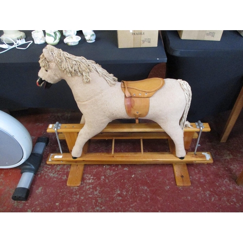 322 - A pine framed rocking horse