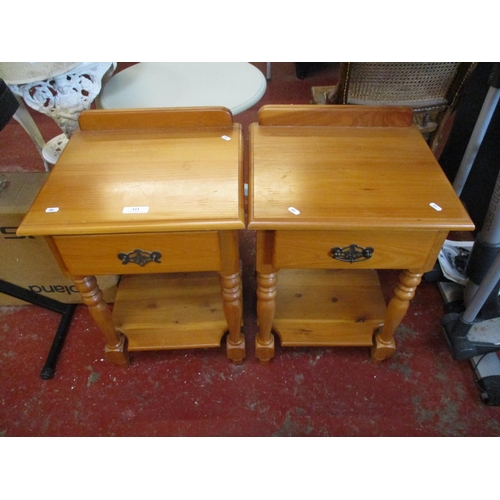 323 - A pair of pine bedside tables fitted a drawer and an under tier