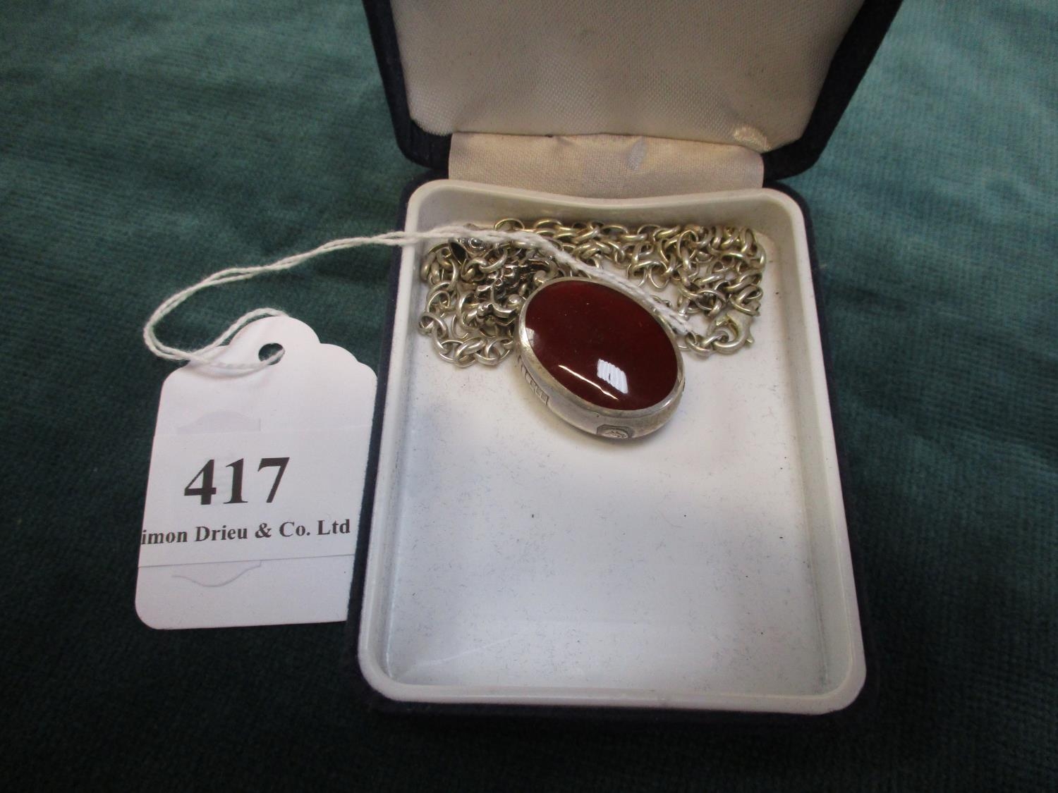 A heavy sterling silver pictorial pendant on fob chain by David Scott