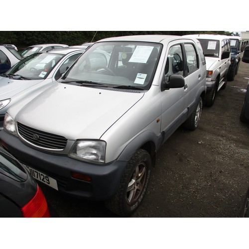 23 - A 1999 Daihatsu Terios + 1.3 SUV J117129 (petrol/manual), odometer reading 115,330 miles