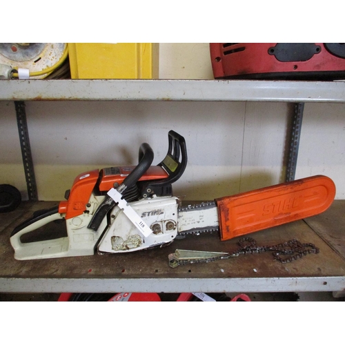 118 - A Stihl 038 petrol chainsaw with spare chain and spanner