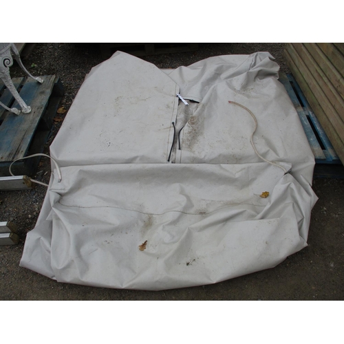 38 - A reinforced plastic cover with elasticated restraints