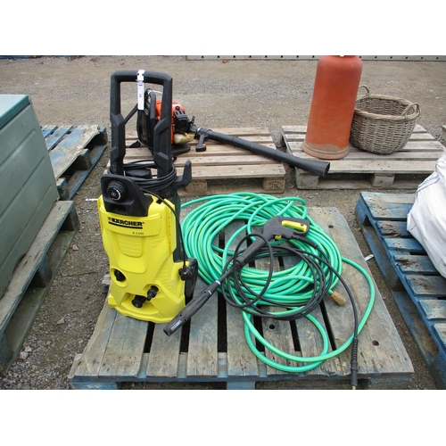 82 - A Karcher K3.540 pressure washer together with a coil of hose pipe