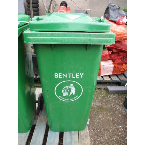 93 - A green PVC wheelie bin