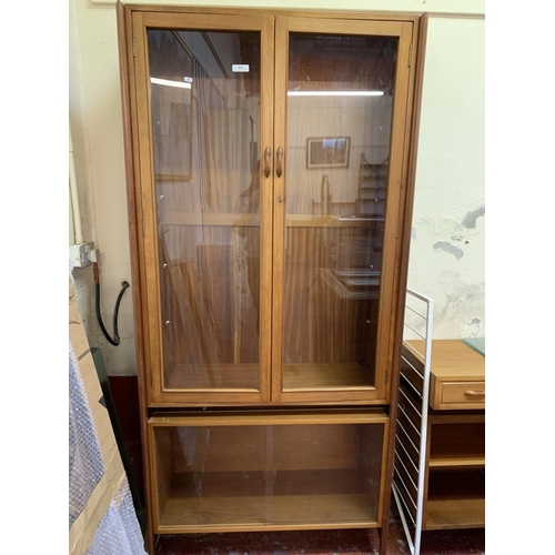 369 - A mid century Ladderax part glazed display cabinet