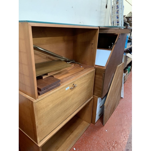 436 - A range of assorted mid century Ladderax wall cabinets and other furniture