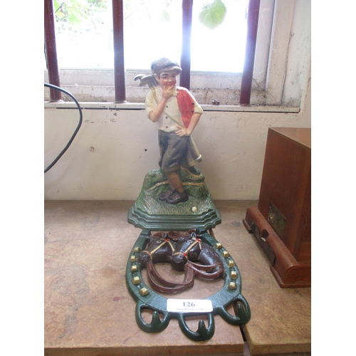 126 - A cast iron door stop modelled in the form of a golfer together with a clothes horse modelled in the... 