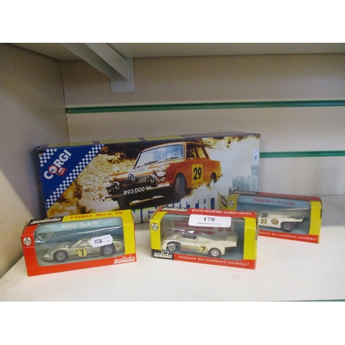 178 - A Corgi mint boxed rally set together with three vintage Solido racing cars