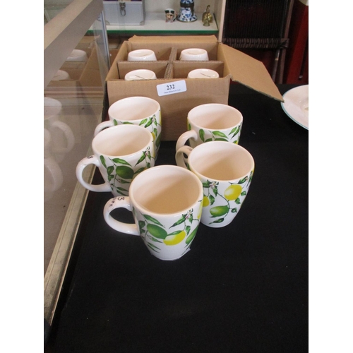 232 - Nine mugs decorated with lemons - new