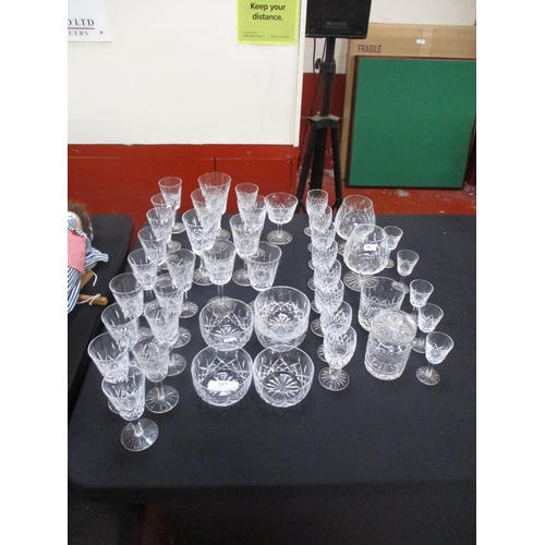 237 - A large accumulation of Waterford crystal drinking glasses