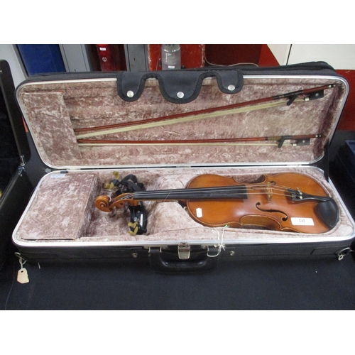 242 - A cased violin and bow