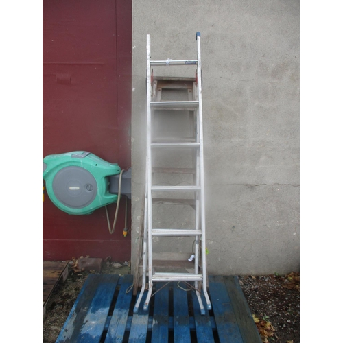 53 - A wooden seven tread ladder together with a six tread combination ladder