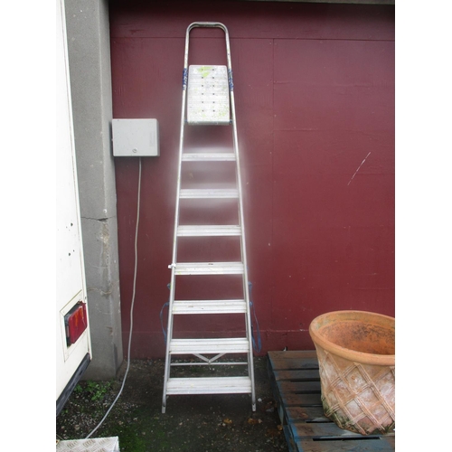 56 - An eight tread aluminium step ladder